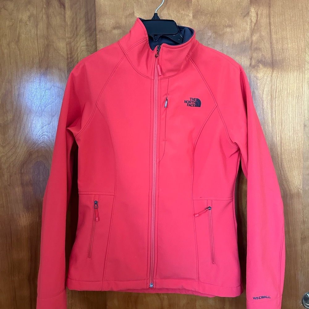 Red/Orange North Face waterproof jacket